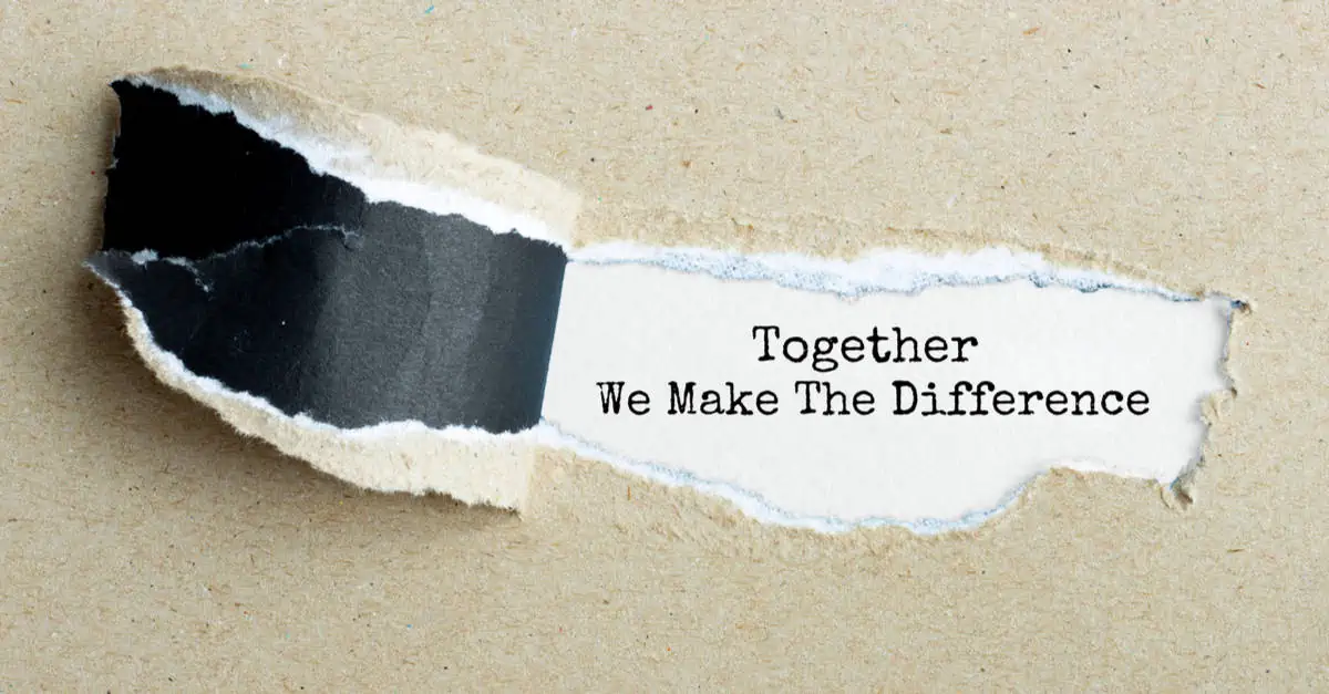 Paper peeling back to reveal message saying 'together we make the difference'